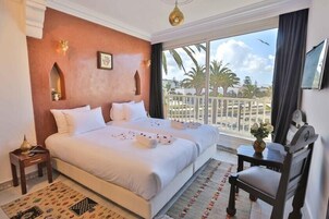 Deluxe Studio, 2 Twin Beds, Smoking, Sea View | Premium bedding, blackout drapes, free cribs/infant beds, free WiFi