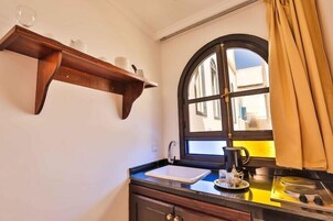 Fridge, oven, stovetop, espresso maker