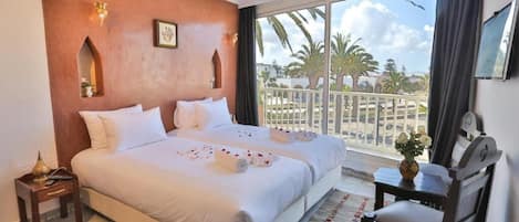 Deluxe Studio, 2 Twin Beds, Smoking, Sea View | Premium bedding, blackout drapes, free cribs/infant beds, free WiFi