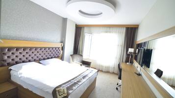 Premium bedding, minibar, in-room safe, desk