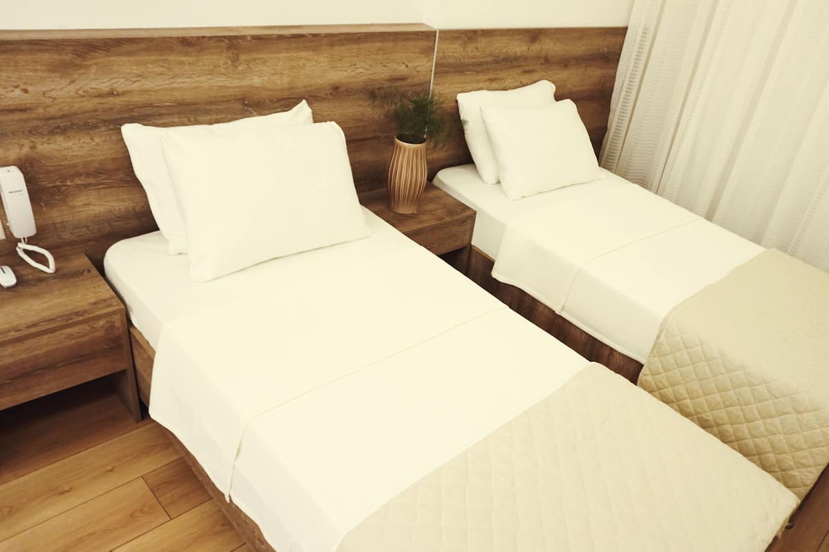 Standard Twin Room | Premium bedding, minibar, in-room safe, iron/ironing board