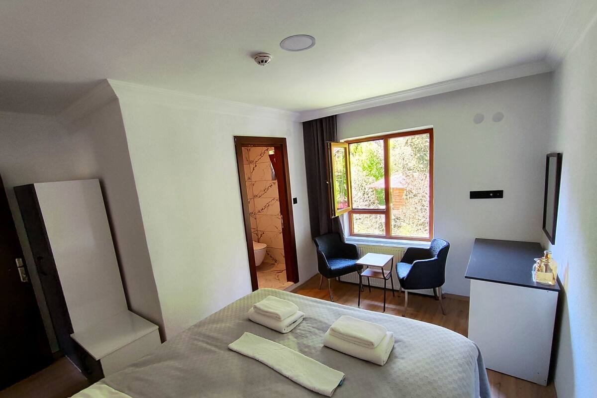 Premium bedding, desk, laptop workspace, WiFi