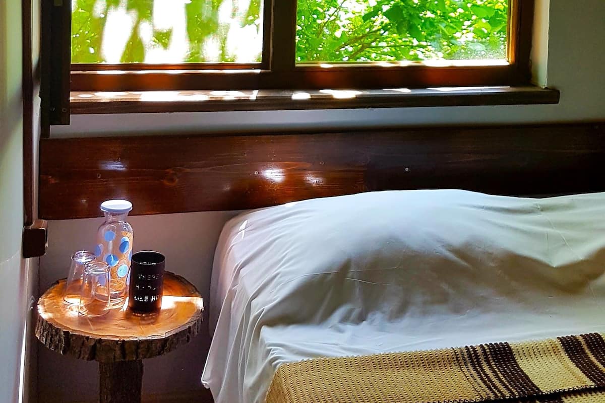 standard cabin, 1 double bed, garden view | 1 bedroom, premium bedding, desk, laptop workspace