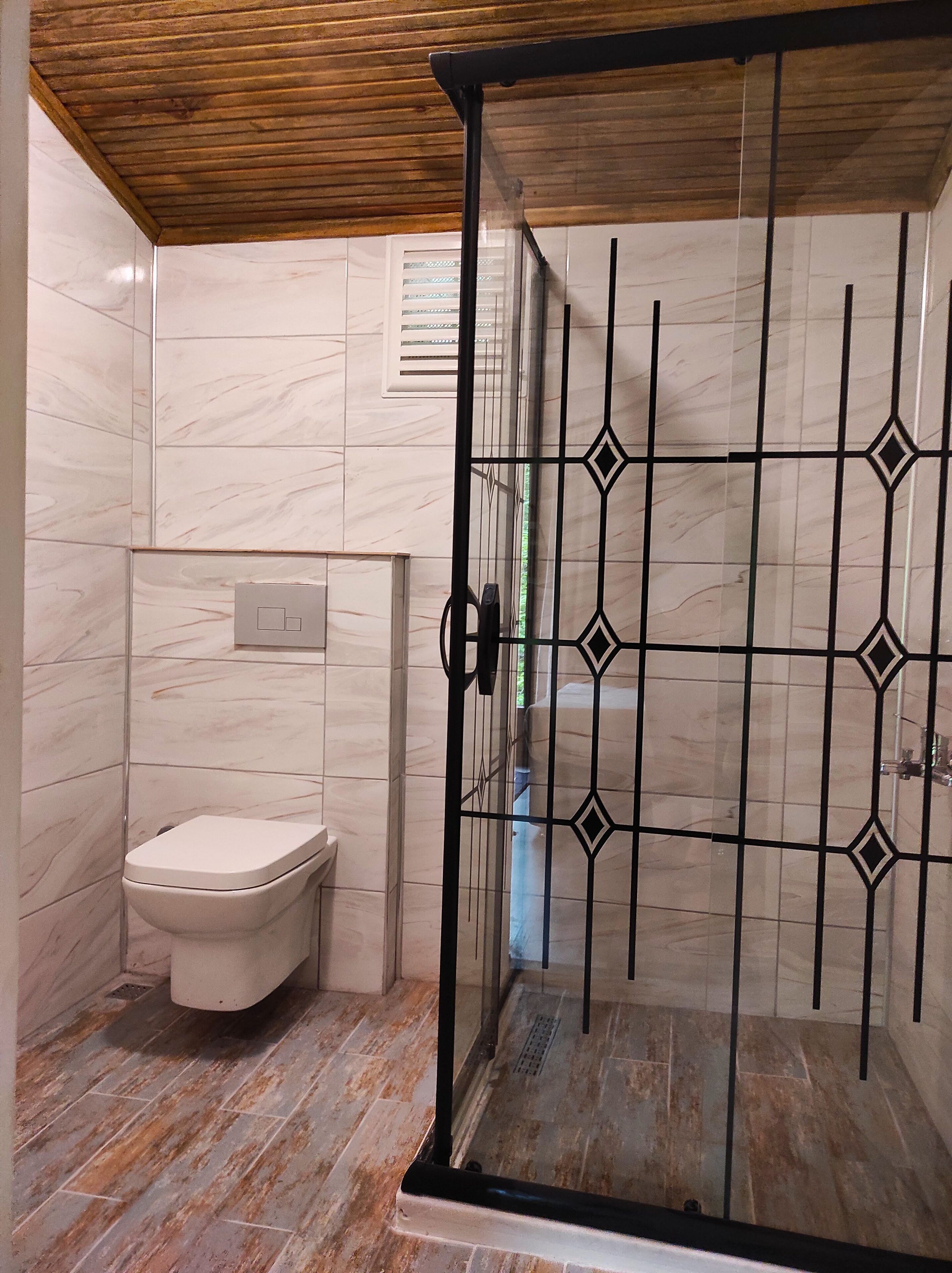 family chalet | bathroom | shower, free toiletries, hair dryer, slippers