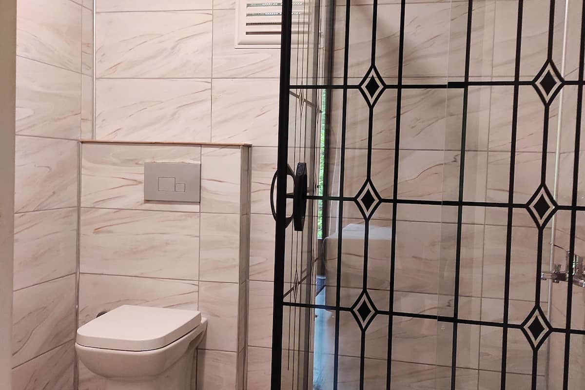 family chalet | bathroom | shower, free toiletries, hair dryer, slippers