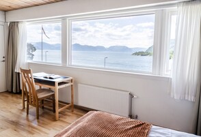 Quarto casal luxo, vista para o mar | Cortinas blackout, Wi-Fi de cortesia, roupa de cama