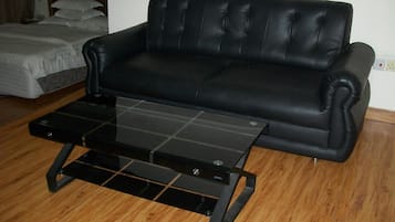 Flat-screen TV, pay movies