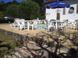 Outdoor pool, pool umbrellas, sun loungers