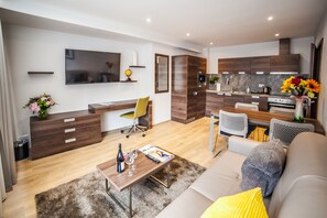 65-inch flat-screen TV with cable channels, plasma TV - Hampton Suites Serviced Apartments (Thames Ditton)