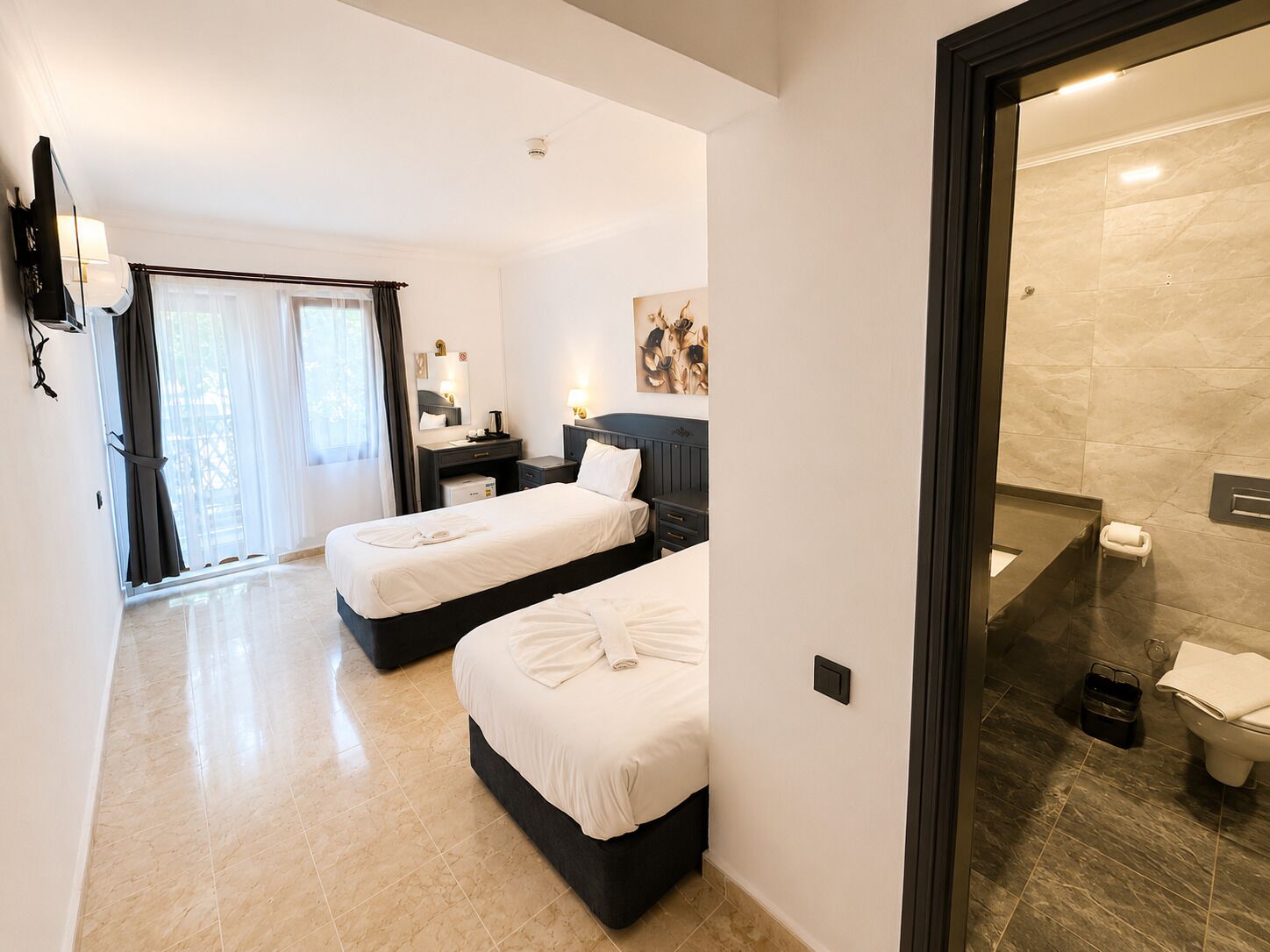 Chambre Standard double ou avec lits jumeaux | Accès au Wi-Fi (inclus), literie fournie