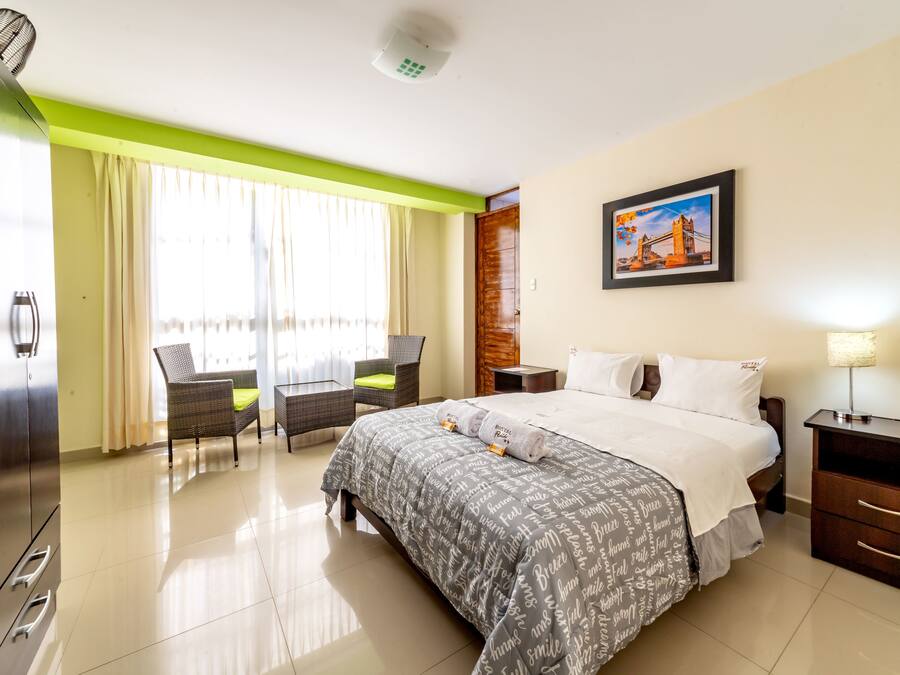 Deluxe Double Room, City View | Desk, iron/ironing board, free WiFi, bed sheets