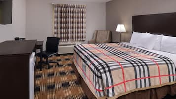 Escritorio, tabla de planchar con plancha, wifi gratis y ropa de cama