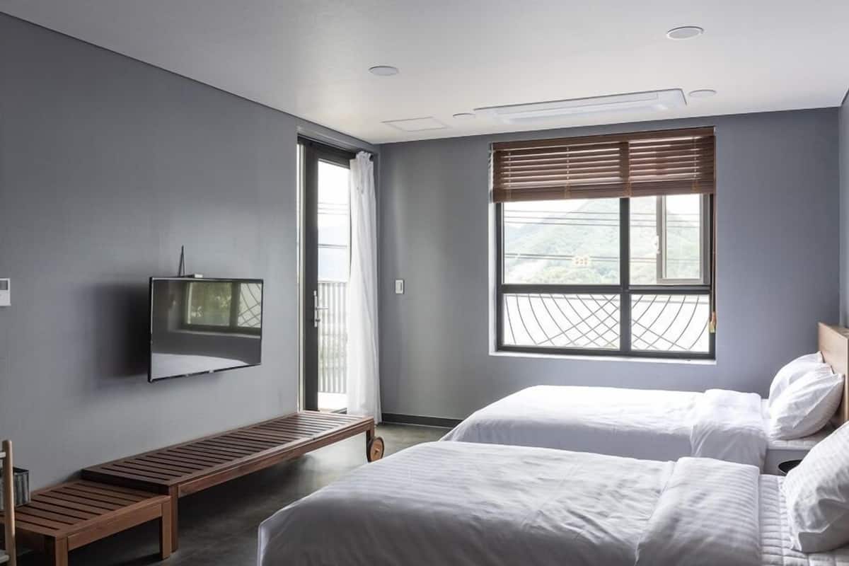Deluxe Twin Room, 1 Bedroom (Stay - New Building) | WiFi (free), bed sheets