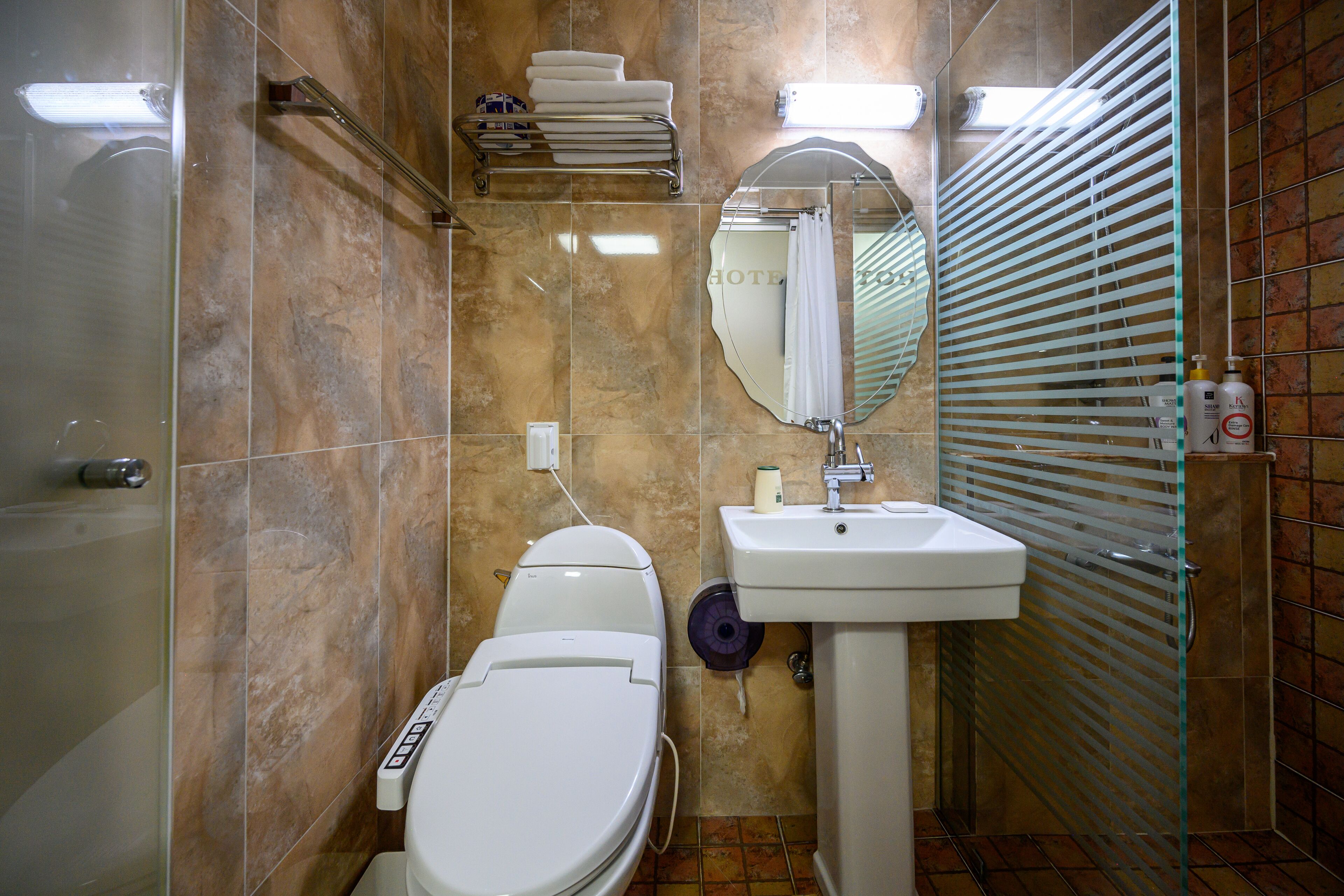 comfort twin room, 2 single beds | bathroom | shower, free toiletries, hair dryer, slippers