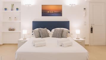 Suite junior | Sábanas italianas Frette, ropa de cama de alta calidad y edredón
