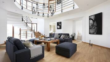 Luxury Villa, 5 Bedrooms, Partial Sea View | Living area | 65-inch flat-screen TV with satellite channels, LCD TV, fireplace