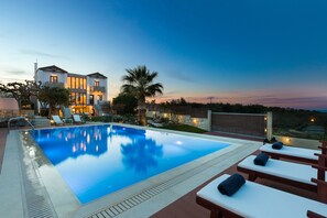 Outdoor pool, pool umbrellas, sun loungers