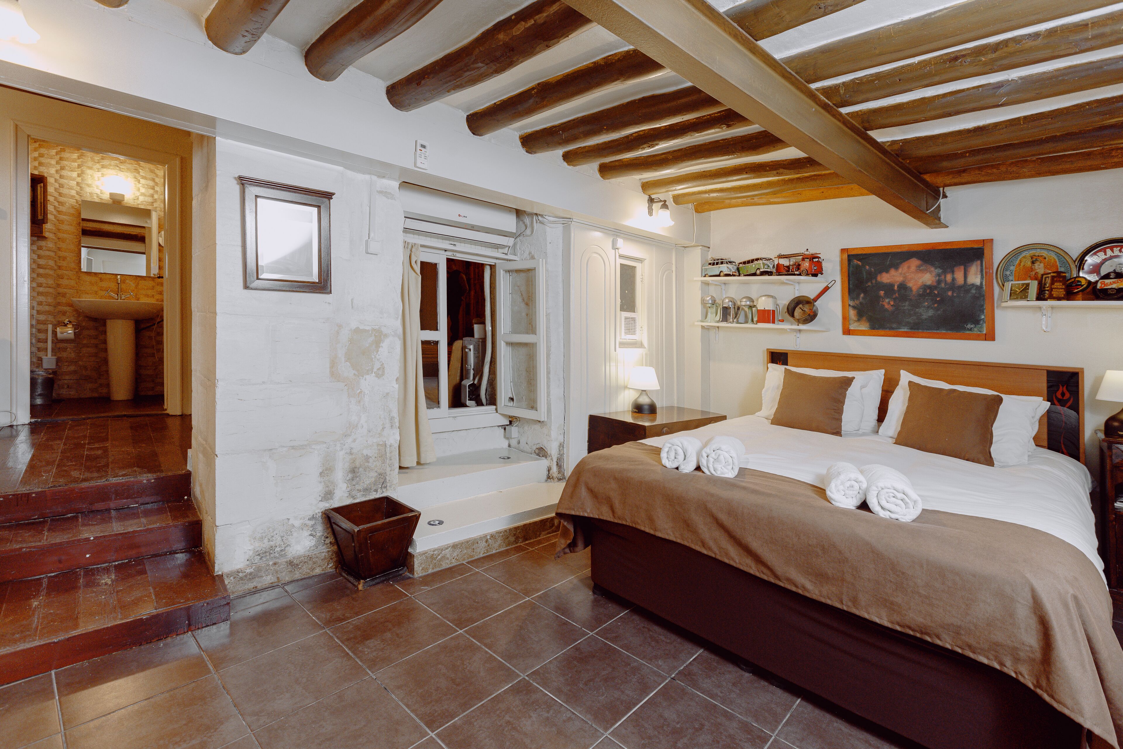 economy double room, courtyard view | 1 bedroom, minibar, in-room safe, iron/ironing board