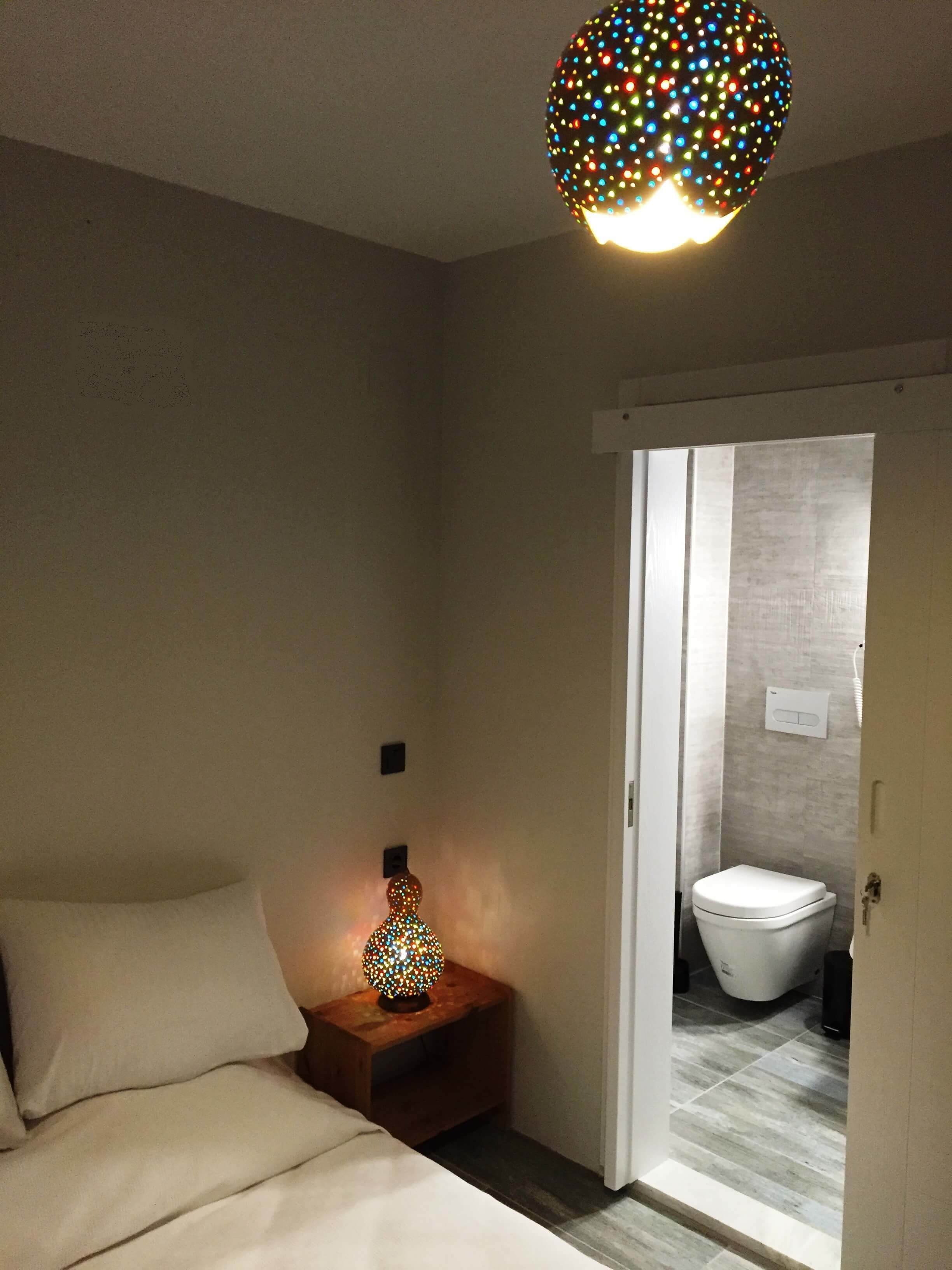 double room, pool view | living area | flat-screen tv