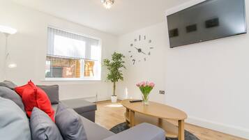 Standard House, 3 Bedrooms | Living room | Flat-screen TV