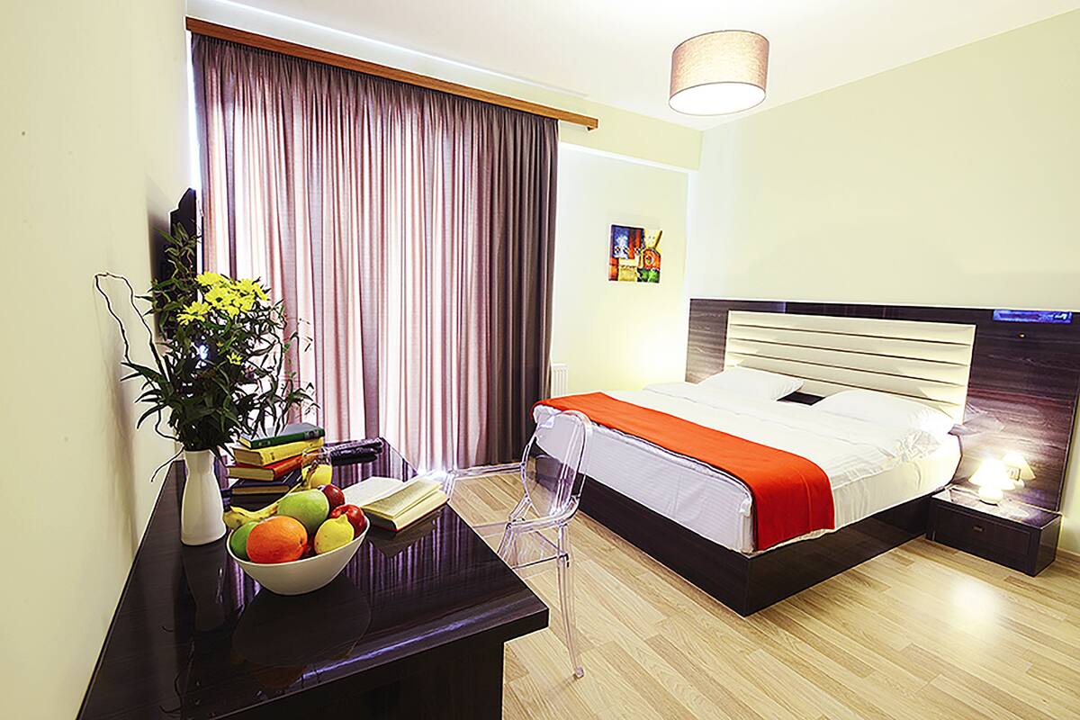 Apartment, 1 Bedroom, Balcony | Desk, iron/ironing board, cribs/infant beds, rollaway beds