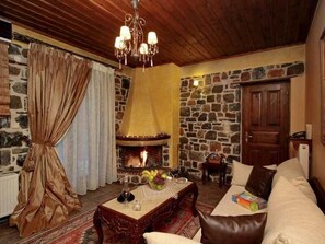 Apartment, 1 Bedroom, Fireplace, Mountain View | Living room | Flat-screen TV, DVD player - Menalia Villas & Suites (Tripoli)
