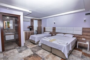 Family Triple Room, Sea View | Premium bedding, minibar, desk, free WiFi - Uzunhan Hotel (Ayvalik)