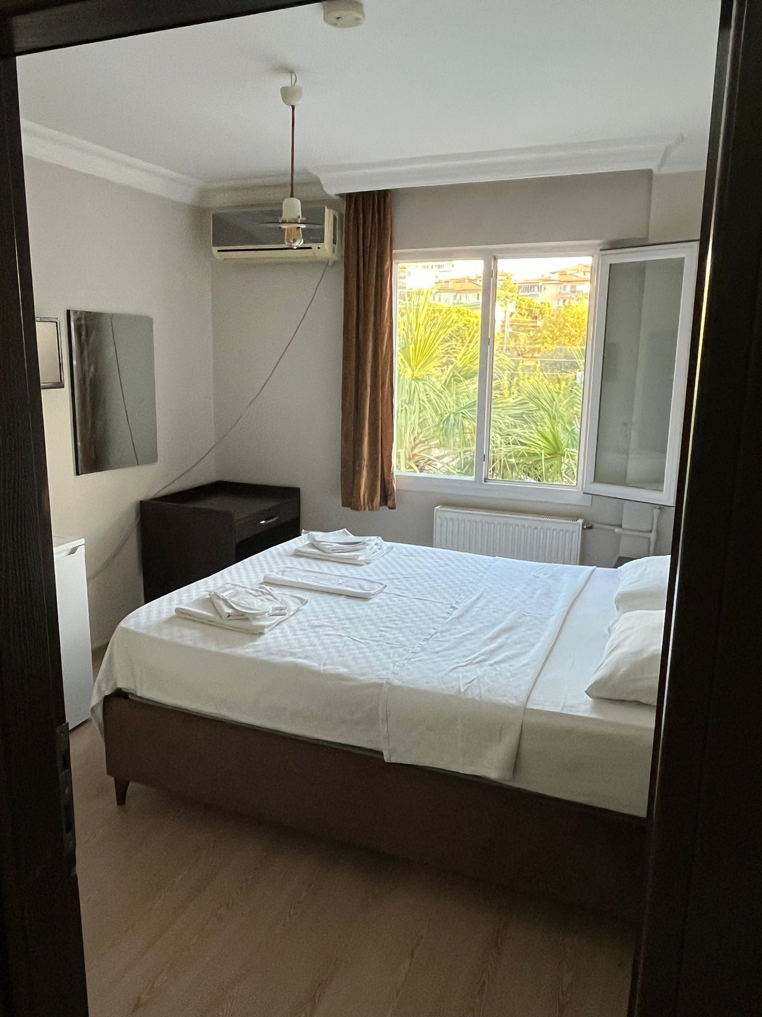 Economy Room | Premium bedding, minibar, desk, free WiFi