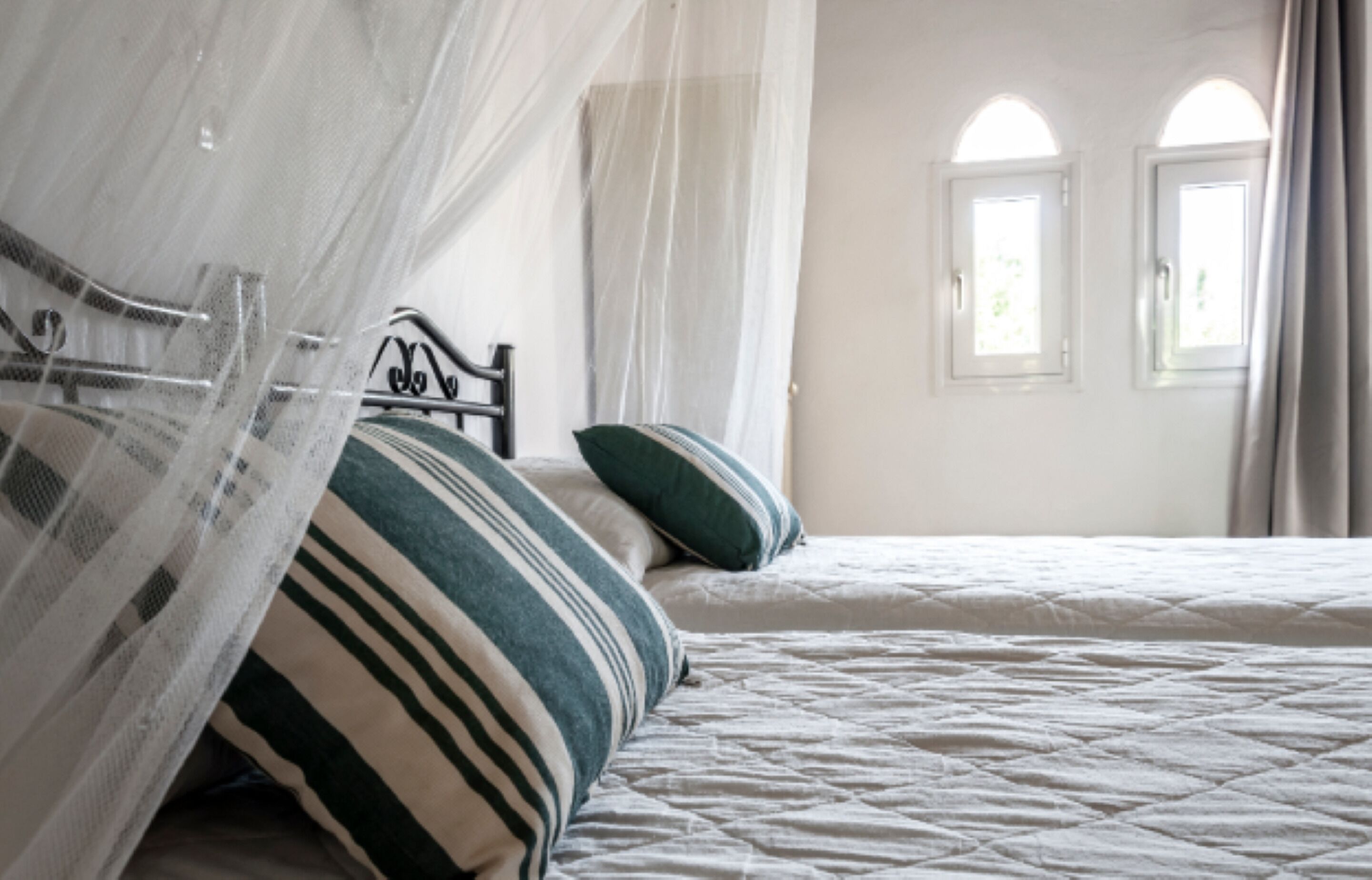 Apartemen, 2 kamar tidur | Brankas, setrika/meja setrika, Wi-Fi gratis, dan seprai linen