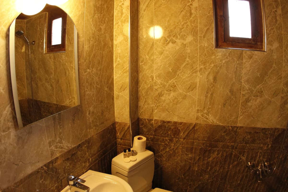 basic room, 1 bedroom, non smoking, city view | bathroom | shower, free toiletries, hair dryer, slippers