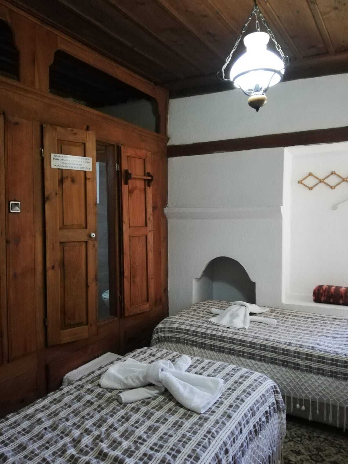 economy twin room, 1 bedroom, non smoking, garden view | 1 bedroom, desk, iron/ironing board, free wifi