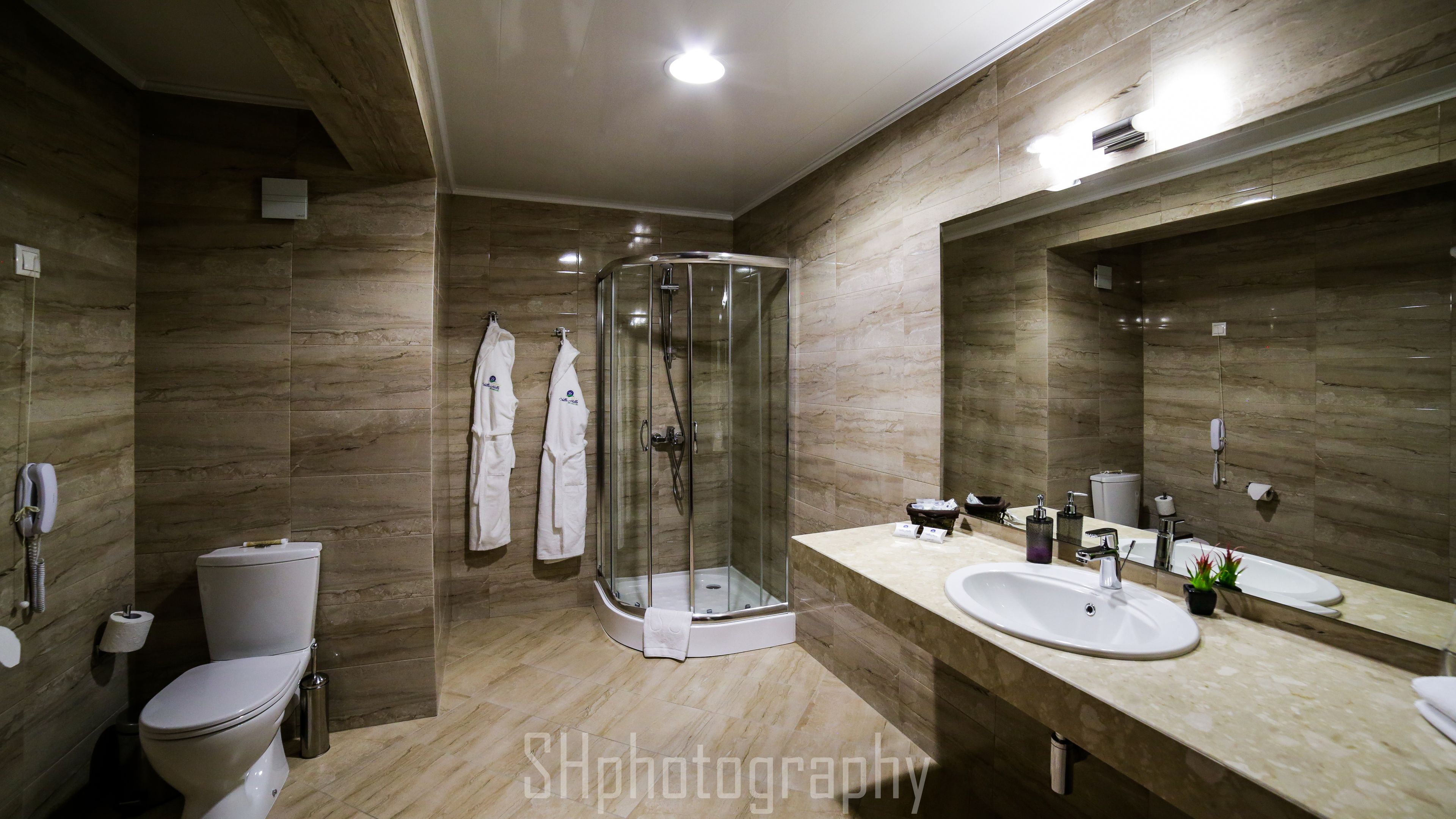 shower, hair dryer, bathrobes, slippers