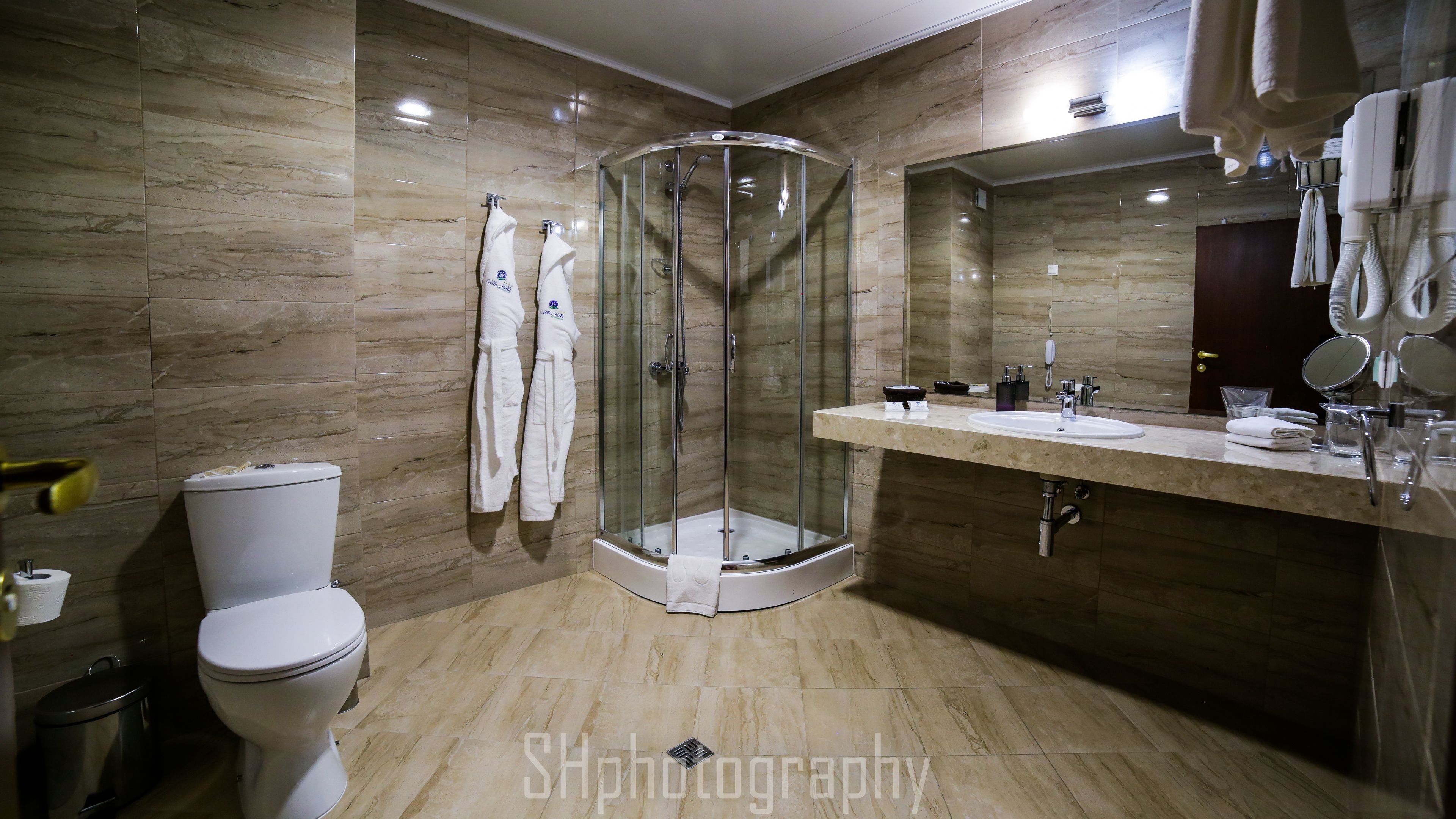 standard double room, balcony | bathroom | shower, hair dryer, bathrobes, slippers