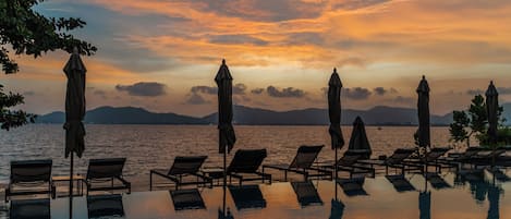 2 outdoor pools, open 8:00 AM to 7:00 PM, pool umbrellas, sun loungers