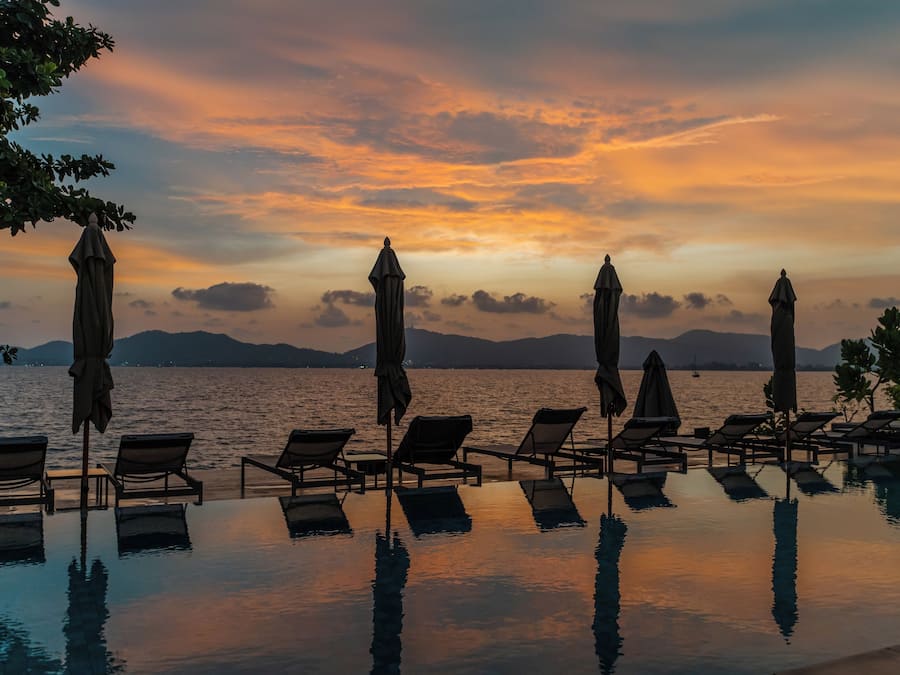 2 outdoor pools, open 8:00 AM to 7:00 PM, pool umbrellas, pool loungers