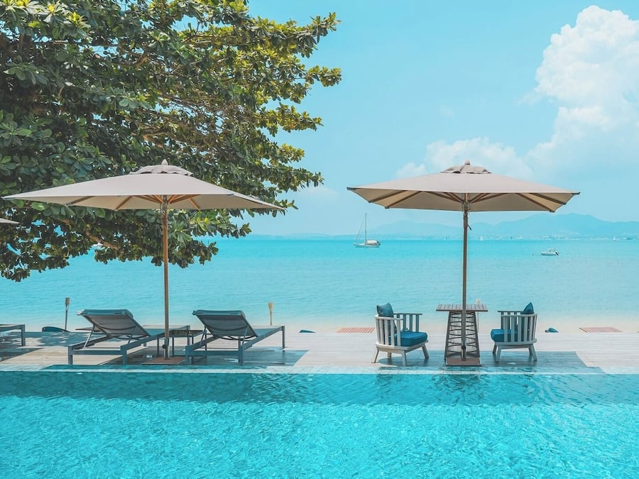 2 outdoor pools, open 8:00 AM to 7:00 PM, pool umbrellas, pool loungers