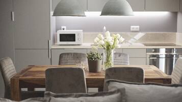 Apartment, 2 Bedrooms | Private kitchenette | Fridge, microwave, oven, stovetop