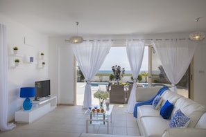 Deluxe-Villa, 4 Schlafzimmer, Strandnähe | Wohnzimmer