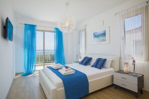 Deluxe Villa, 4 Bedrooms, Beachfront | 4 bedrooms, in-room safe, laptop workspace, iron/ironing board - Mazotos Villa Iris (Mazotos)