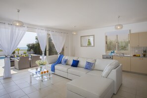 Deluxe Villa, 4 Bedrooms, Beachfront | Living room - Mazotos Villa Iris (Mazotos)