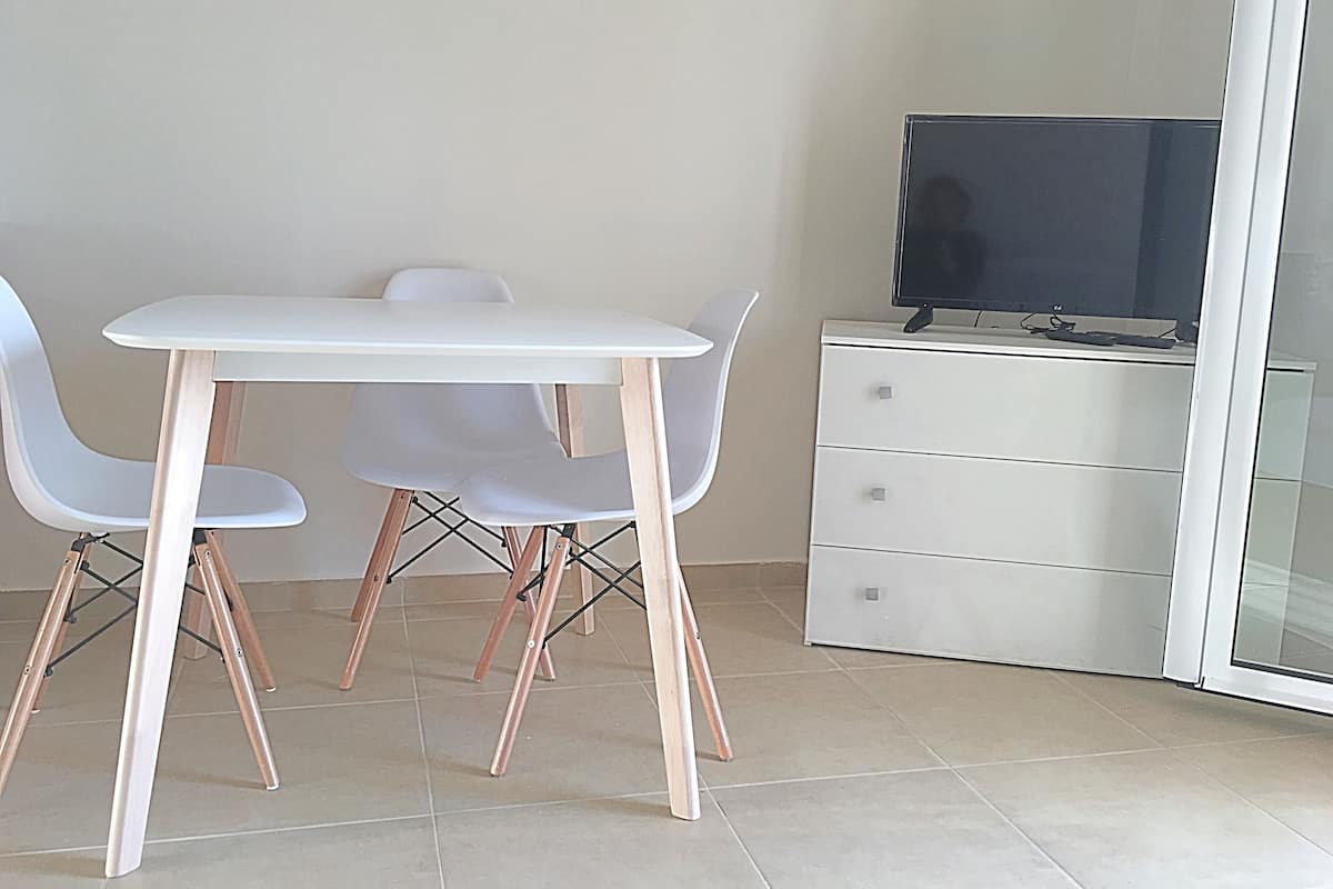 Apartment, 1 Bedroom | Living area | Flat-screen TV