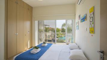 Villa, 3 Bedrooms | 3 bedrooms, in-room safe, iron/ironing board, cribs/infant beds