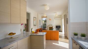 Villa, 3 Bedrooms | Living area | Flat-screen TV, fireplace, DVD player