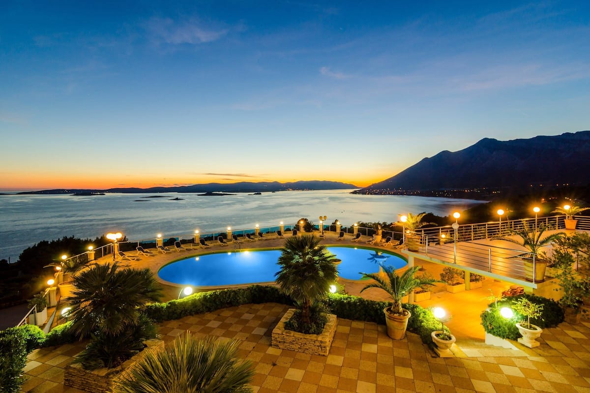 Outdoor pool, pool umbrellas, pool loungers