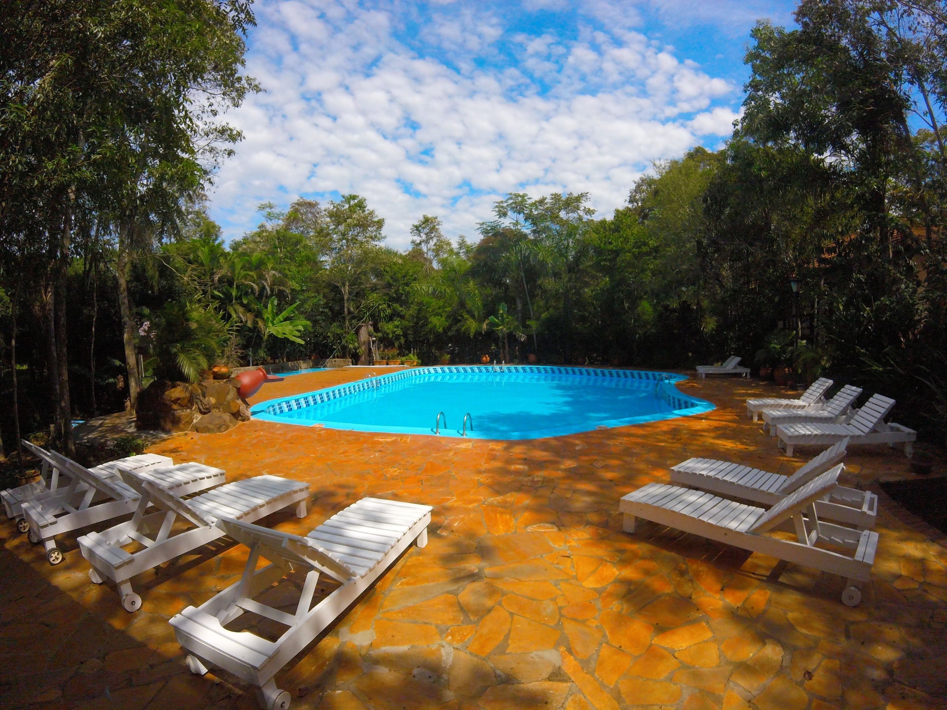 Outdoor pool, open 8:30 AM to 10:00 PM, pool loungers