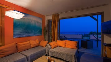 Panoramic Villa, 5 Bedrooms, Sea View, Oceanfront | Living area | Flat-screen TV, table tennis, books, video library
