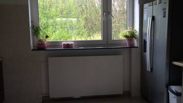 Apartment, 2 Bedrooms, Balcony | Private kitchen | Fridge, microwave, dishwasher, coffee/tea maker