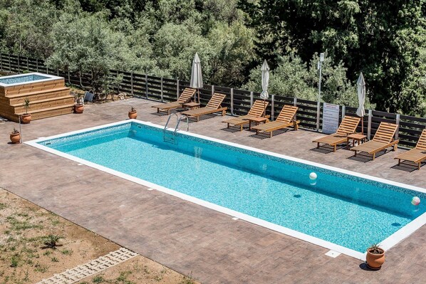 Outdoor pool, pool umbrellas, pool loungers