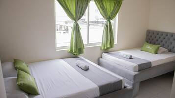 Desk, laptop workspace, free WiFi, bed sheets