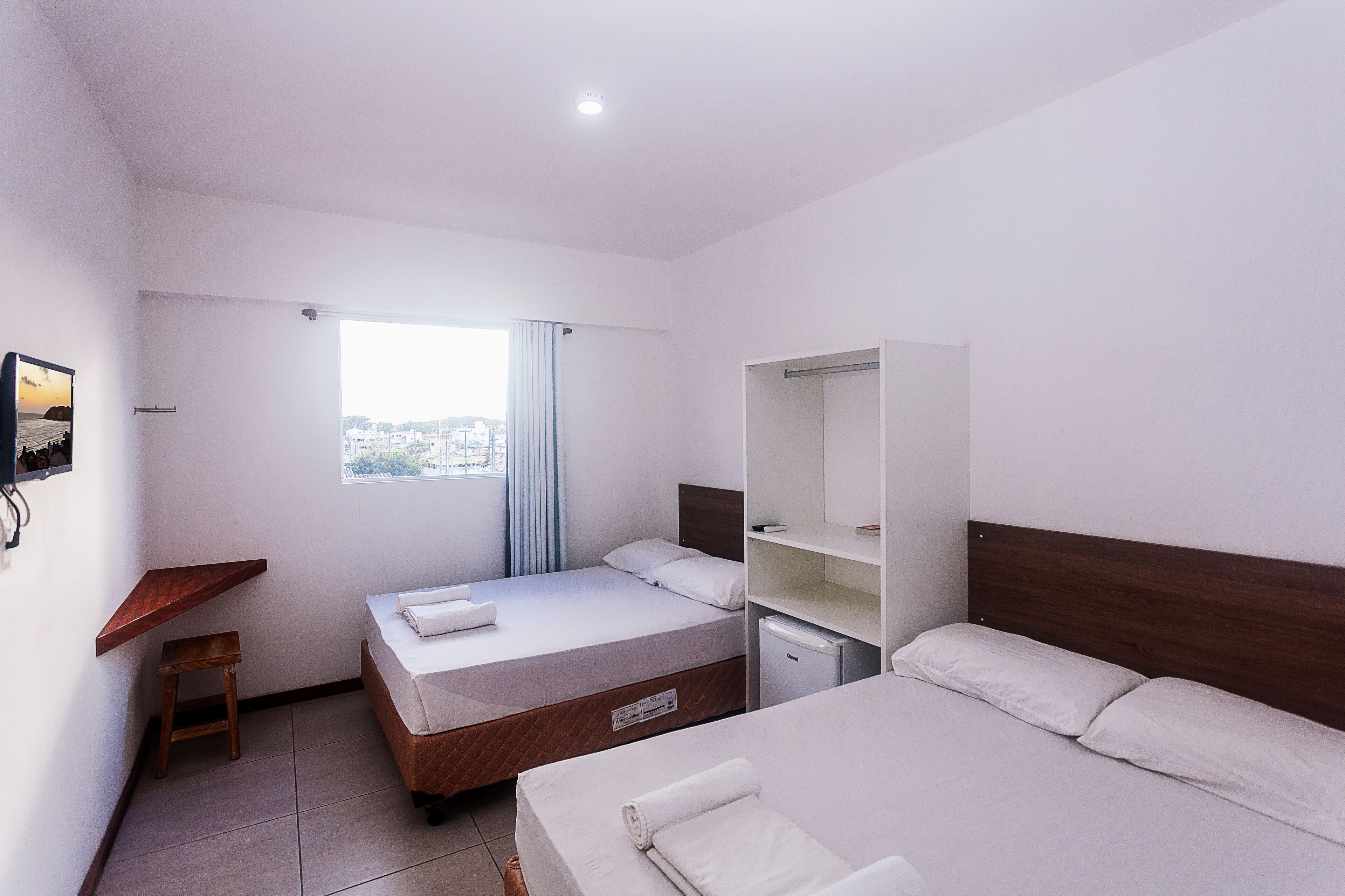 minibar, blackout curtains, bed sheets